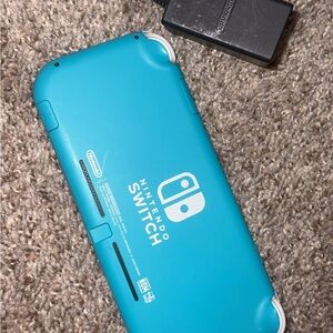 Nintendo switch teal, used like three times.
